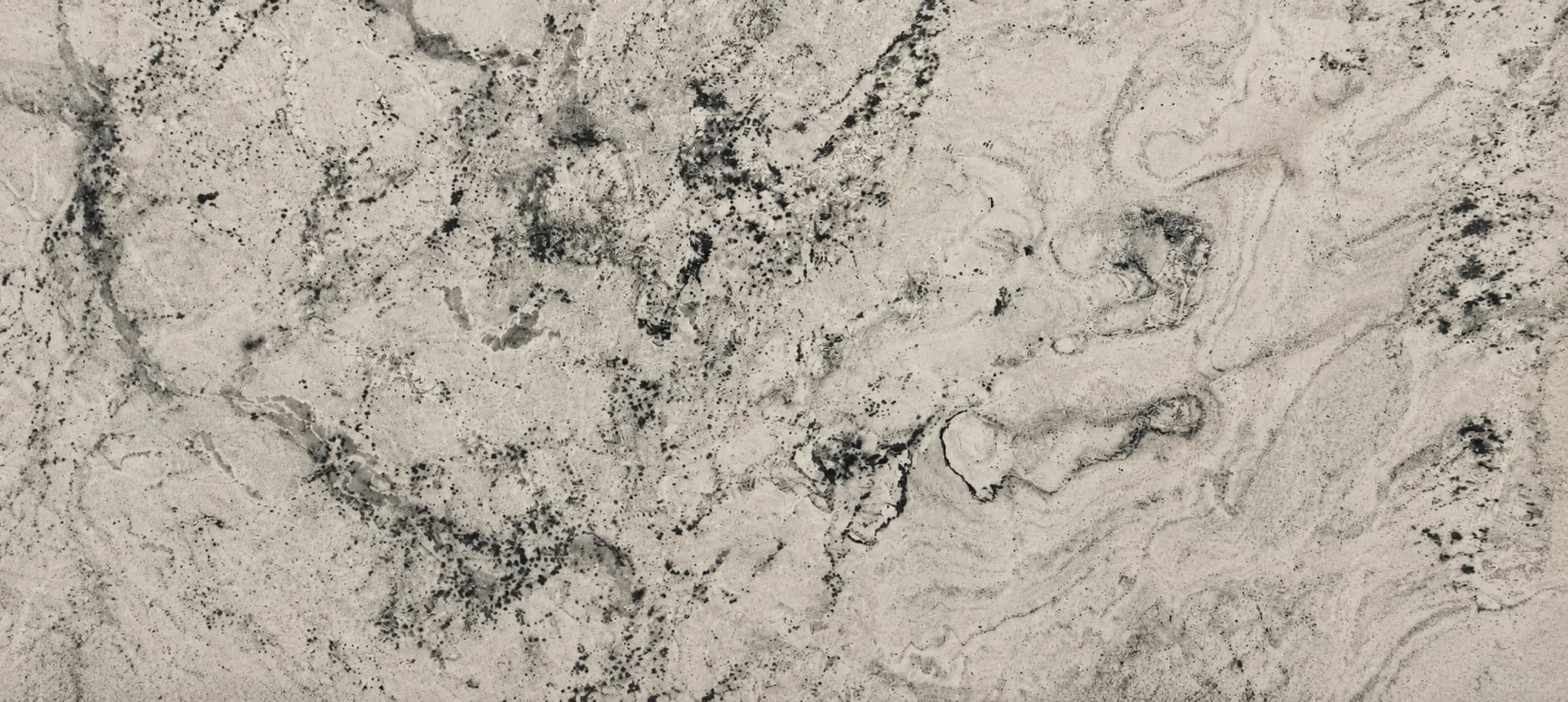 Bianco Romano — manchas oscuras irregulares